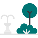 Area giardino con fontana, albero e cespugli.